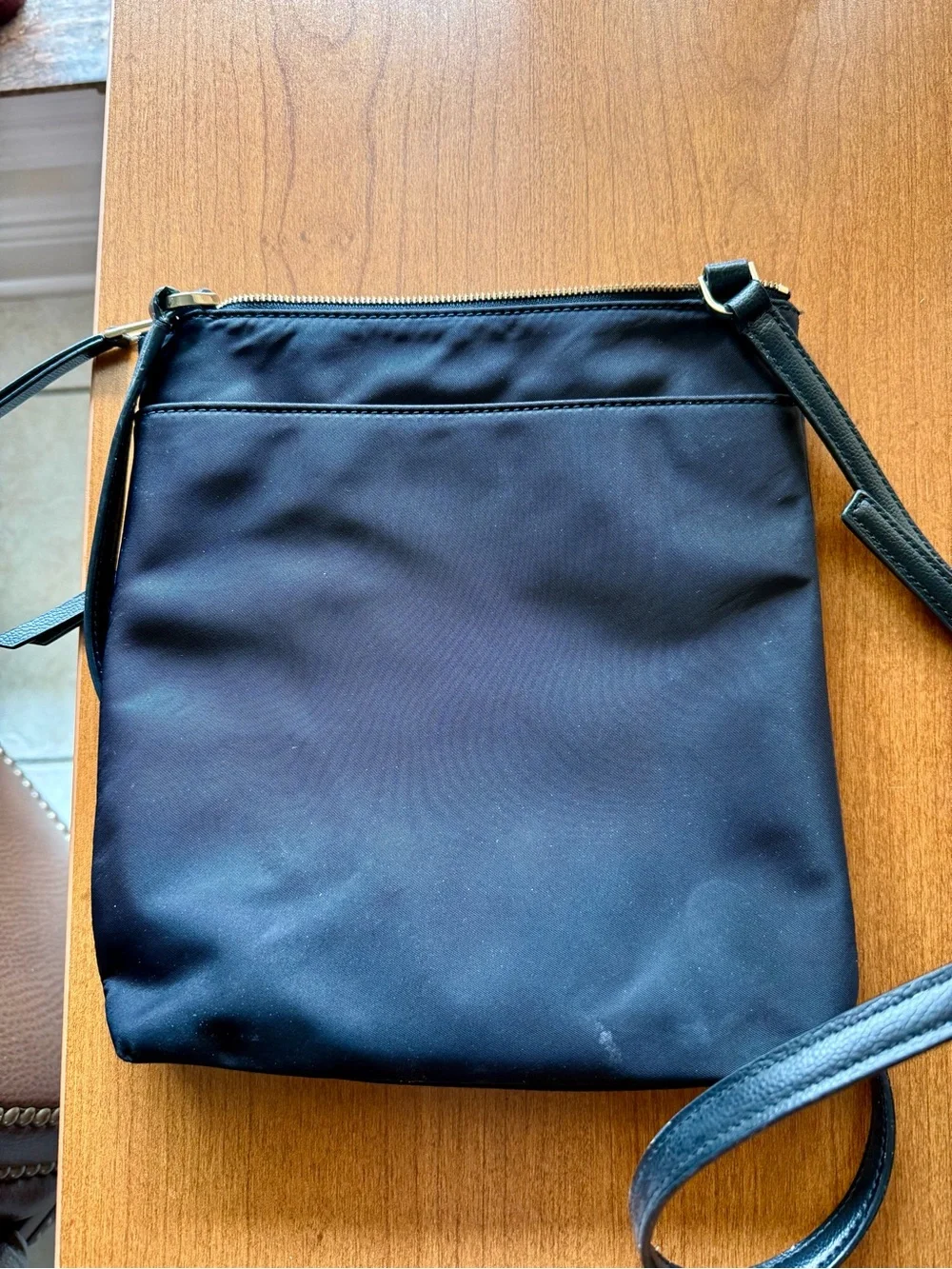 Kate Spade black crossbody bag with gold hardware